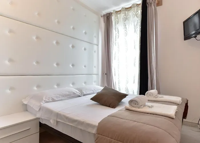 Aparthotel P-rooms & Collection Rom