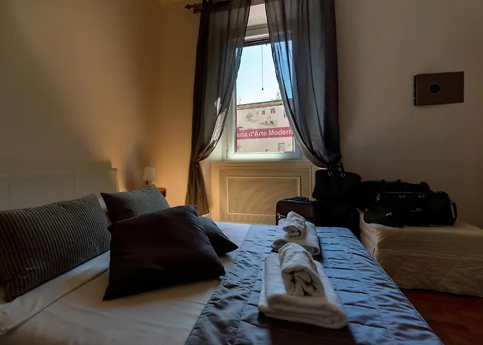 Aparthotel P-rooms & Collection Rom